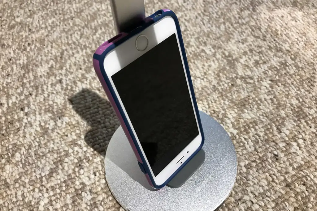 The rubber platform on the Anypro base doubles as an iPhone stand.